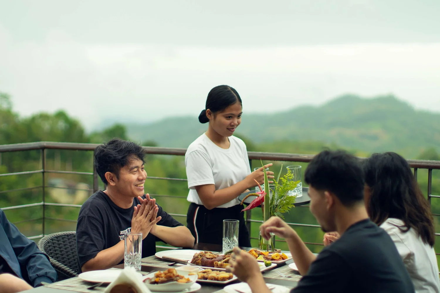 Mist Mountain Cafe dining area with mountain view and local Filipino cuisine